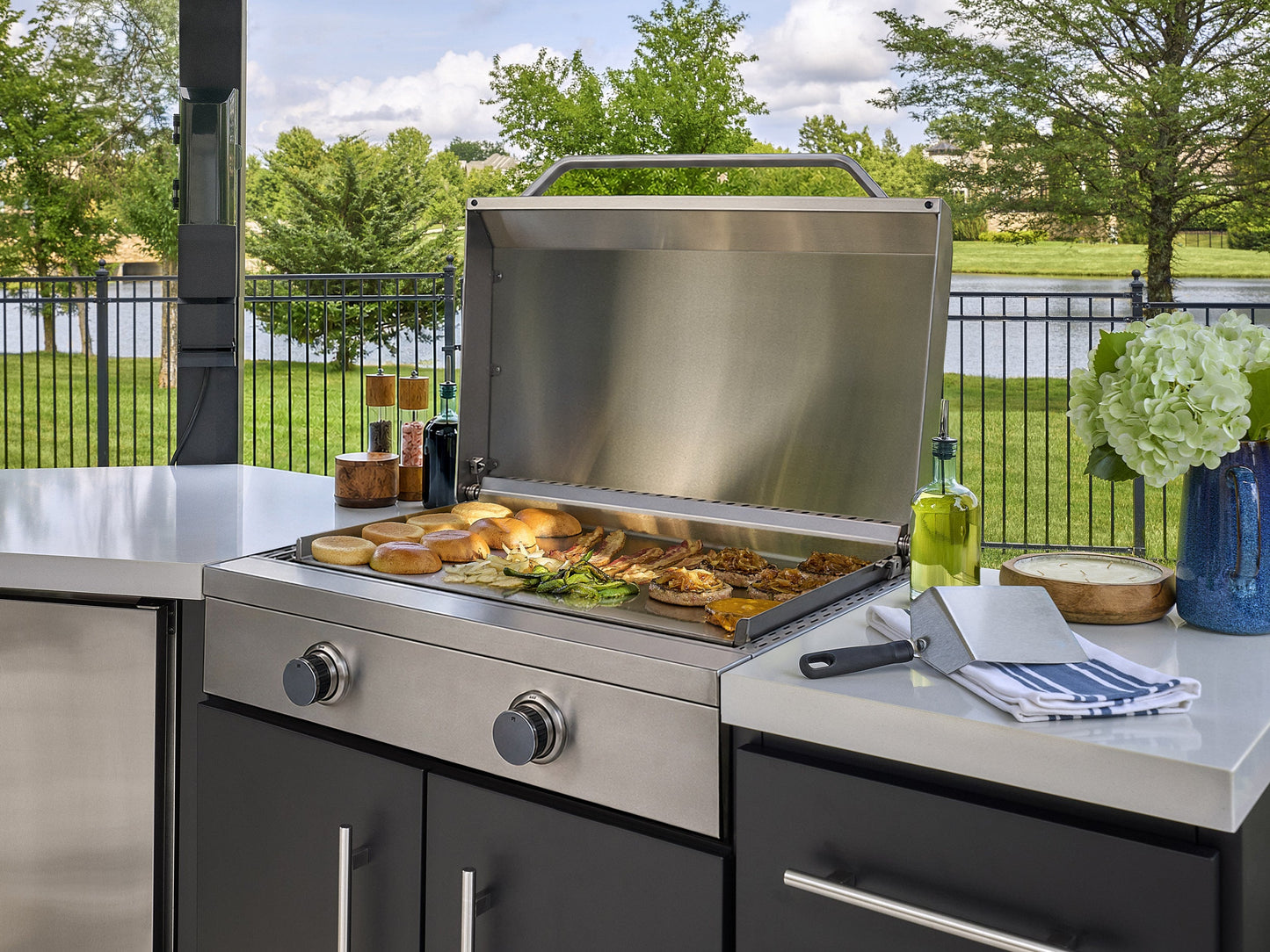 Edgemont Cove | Curved Outdoor Kitchen with Built-In Grill, Griddle & Pizza Oven
