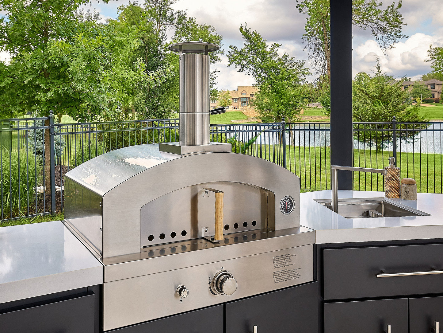 Edgemont Cove | Curved Outdoor Kitchen with Built-In Grill, Griddle & Pizza Oven